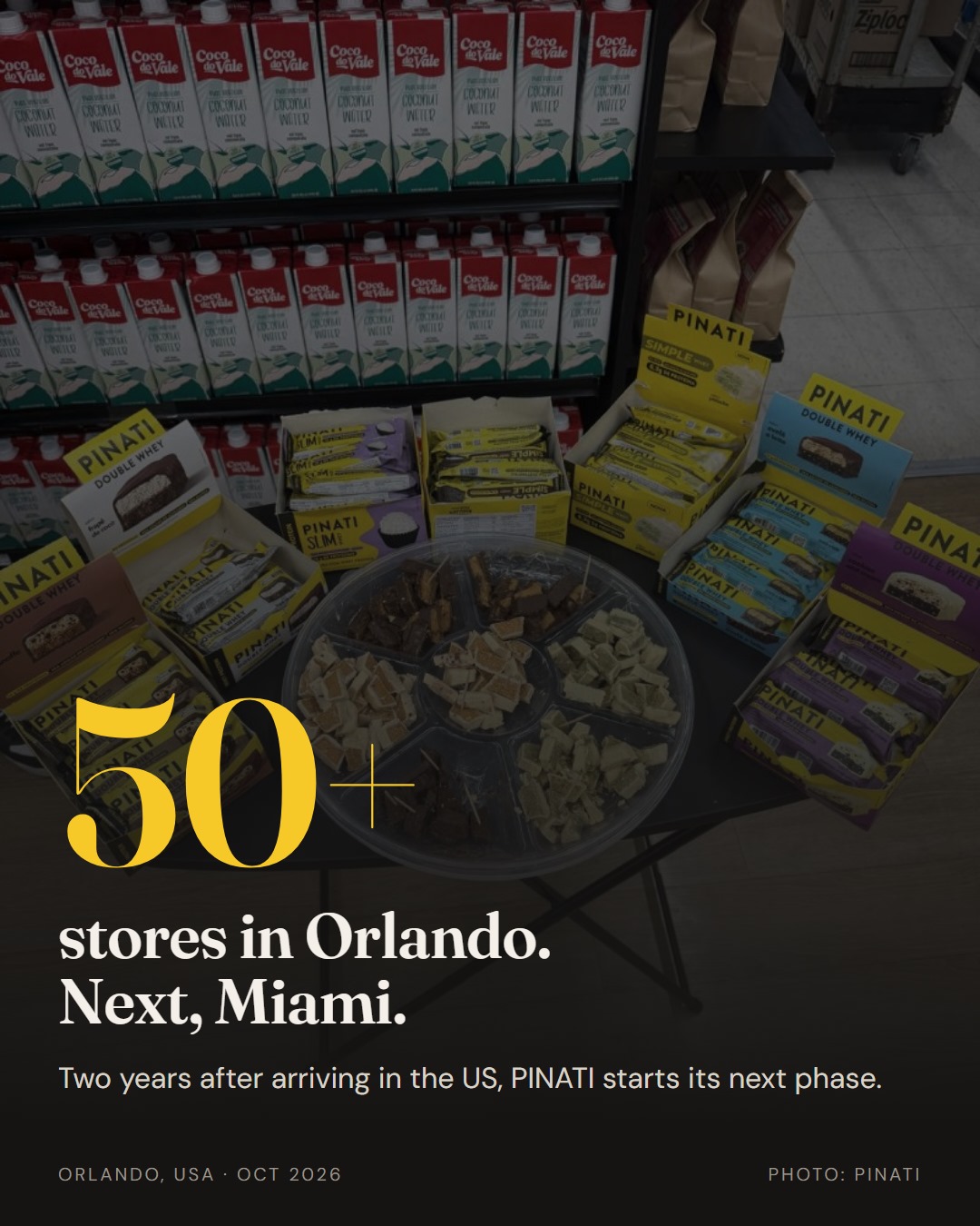 Tasting table with PINATI protein bars at a store in Orlando